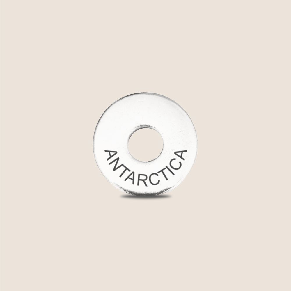 Engraved Antarctica Country Token to remember your holiday, adding it to your travel keychain to make the perfect keepsake.