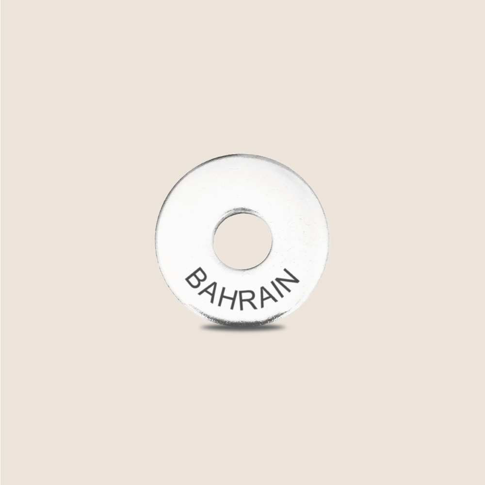 Engraved Bahrain Country Token to remember your holiday, adding it to your travel keychain to make the perfect keepsake.