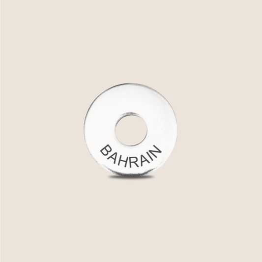 Engraved Bahrain Country Token to remember your holiday, adding it to your travel keychain to make the perfect keepsake.