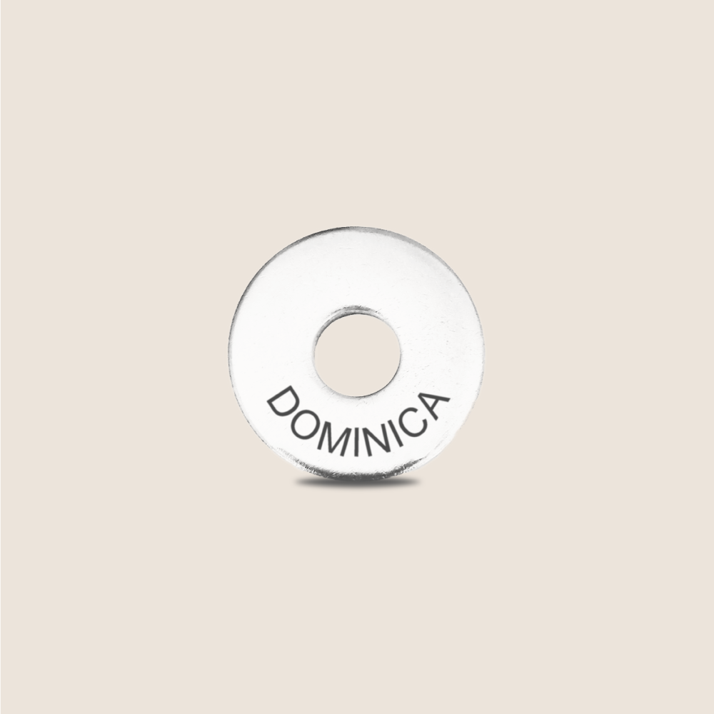 Engraved Dominica Country Token to remember your holiday, adding it to your travel keychain to make the perfect keepsake.