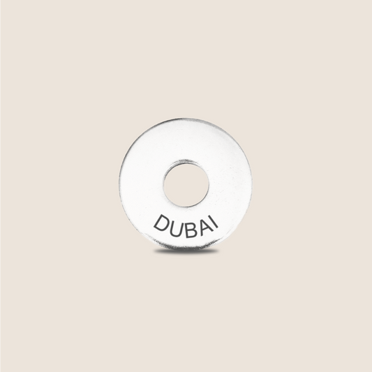 Engraved Dubai Country Token to remember your holiday, adding it to your travel keychain to make the perfect keepsake.