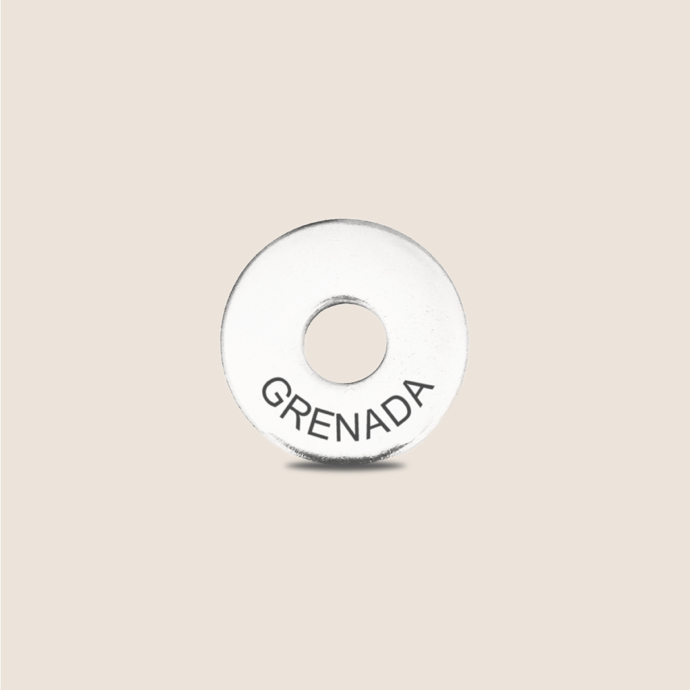 Engraved Grenada Country Token to remember your holiday, adding it to your travel keychain to make the perfect keepsake.