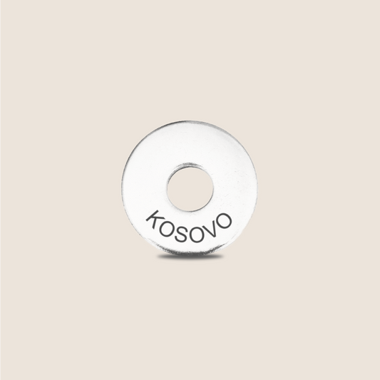 Engraved Kosovo Country Token to remember your holiday, adding it to your travel keychain to make the perfect keepsake.