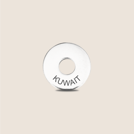 Engraved Kuwait Country Token to remember your holiday, adding it to your travel keychain to make the perfect keepsake.
