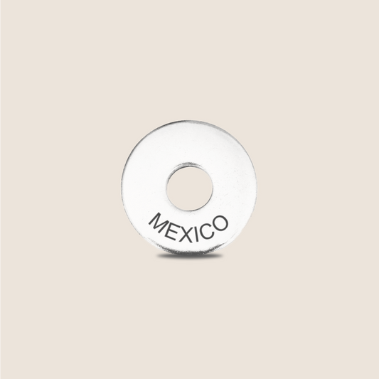 Engraved Mexico Country Token to remember your holiday, adding it to your travel keychain to make the perfect keepsake.