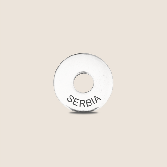 Engraved Serbia Country Token to remember your holiday, adding it to your travel keychain to make the perfect keepsake.