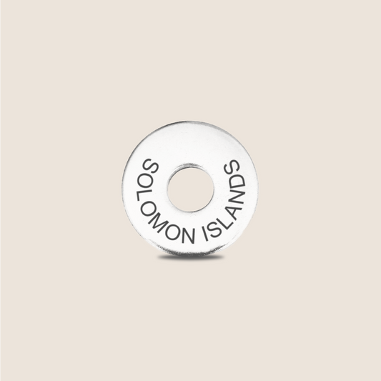 Engraved Solomon Islands Country Token to remember your holiday, adding it to your travel keychain to make the perfect keepsake.