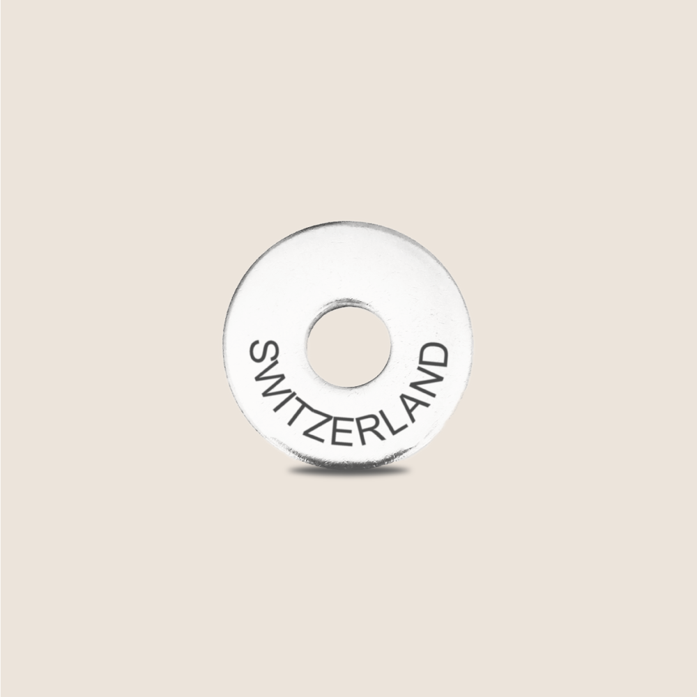 Engraved Switzerland Country Token to remember your holiday, adding it to your travel keychain to make the perfect keepsake.