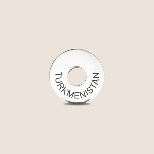 Engraved Turkmenistan Country Token to remember your holiday, adding it to your travel keychain to make the perfect keepsake.
