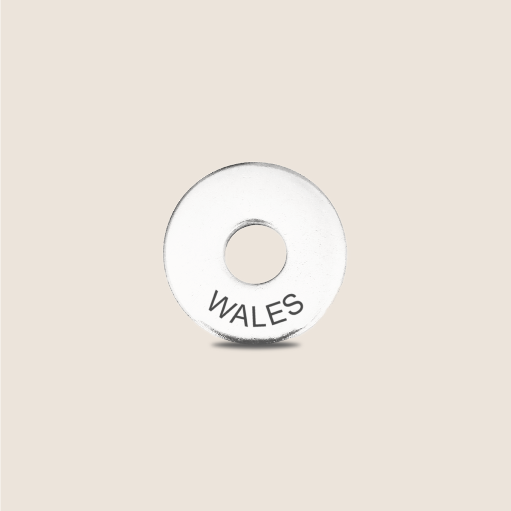 Engraved Wales Country Token to remember your holiday, adding it to your travel keychain to make the perfect keepsake.