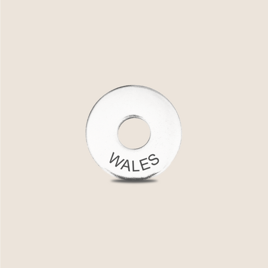 Engraved Wales Country Token to remember your holiday, adding it to your travel keychain to make the perfect keepsake.
