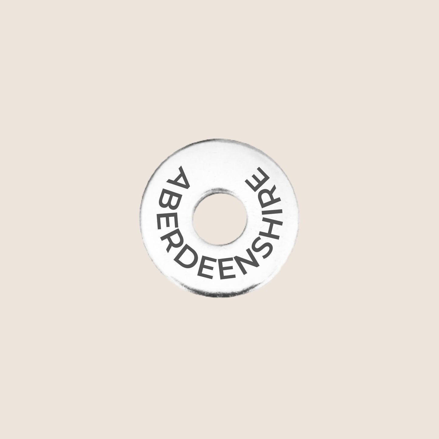 Engraved stainless steel token for each UK County visited, this token is engraved with Aberdeenshire.
