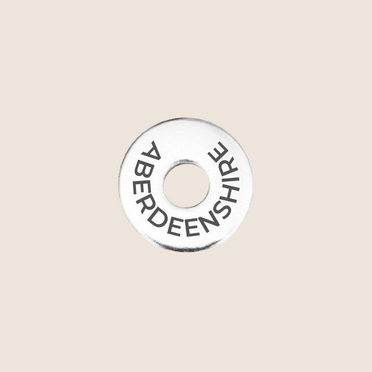 Engraved stainless steel token for each UK County visited, this token is engraved with Aberdeenshire.