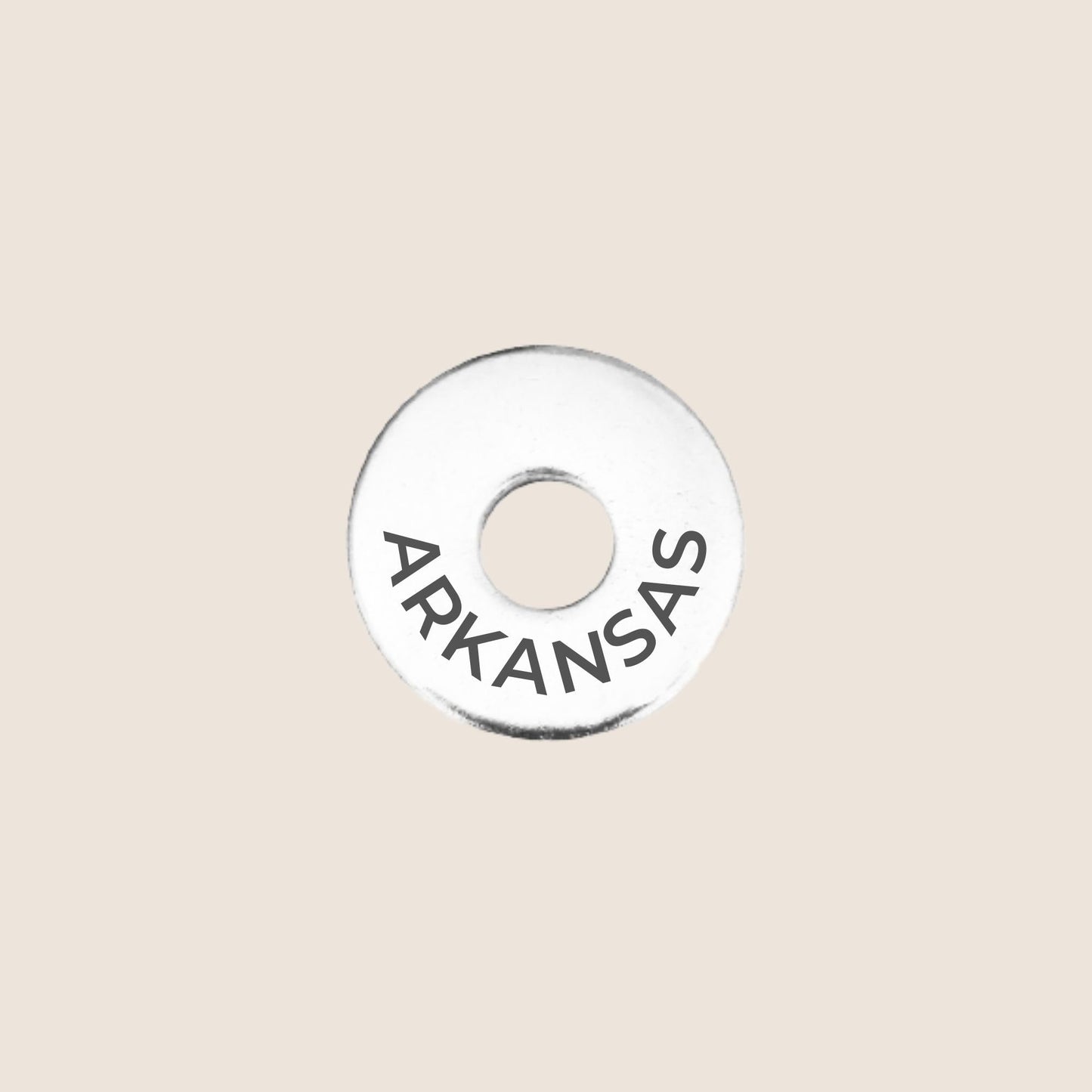 Engraved Arkansas US State Token in stainless steel to add to your travel keepsake collection for your USA adventures.