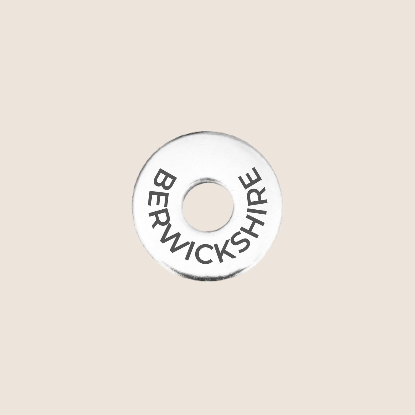 Engraved stainless steel token for each UK County visited, this token is engraved with Berwickshire.
