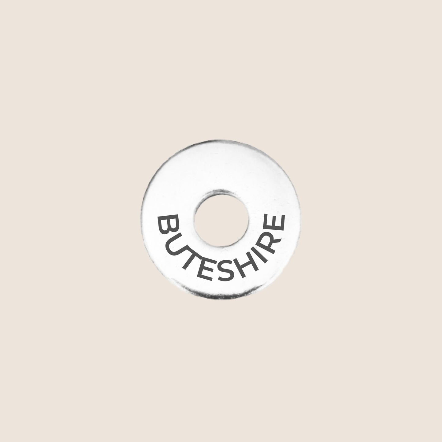 Engraved stainless steel token for each UK County visited, this token is engraved with Buteshire.