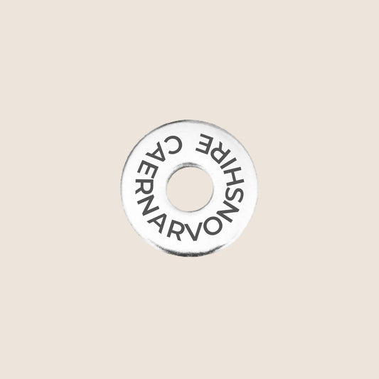 Engraved stainless steel token for each UK County visited, this token is engraved with Caernarvonshire.