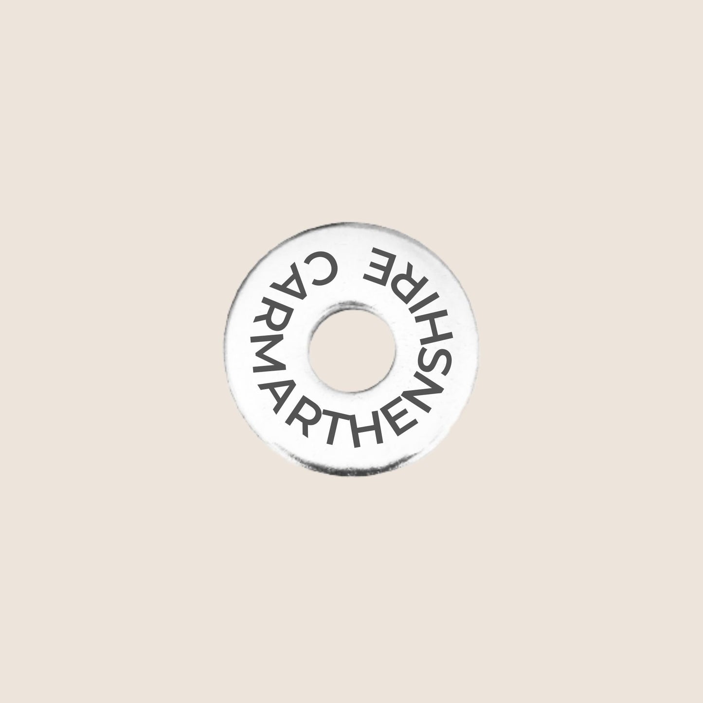 Engraved stainless steel token for each UK County visited, this token is engraved with Carmarthenshire.