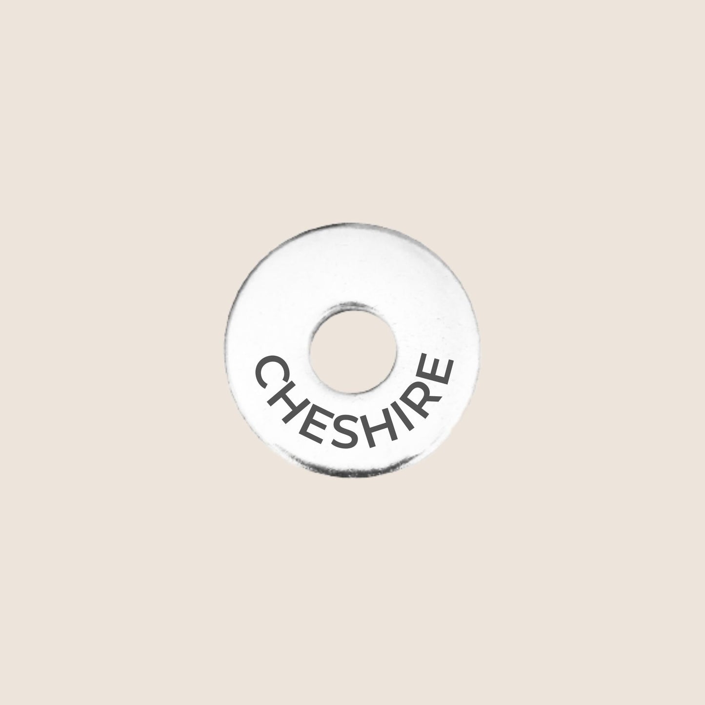 Engraved stainless steel token for each UK County visited, this token is engraved with Cheshire.