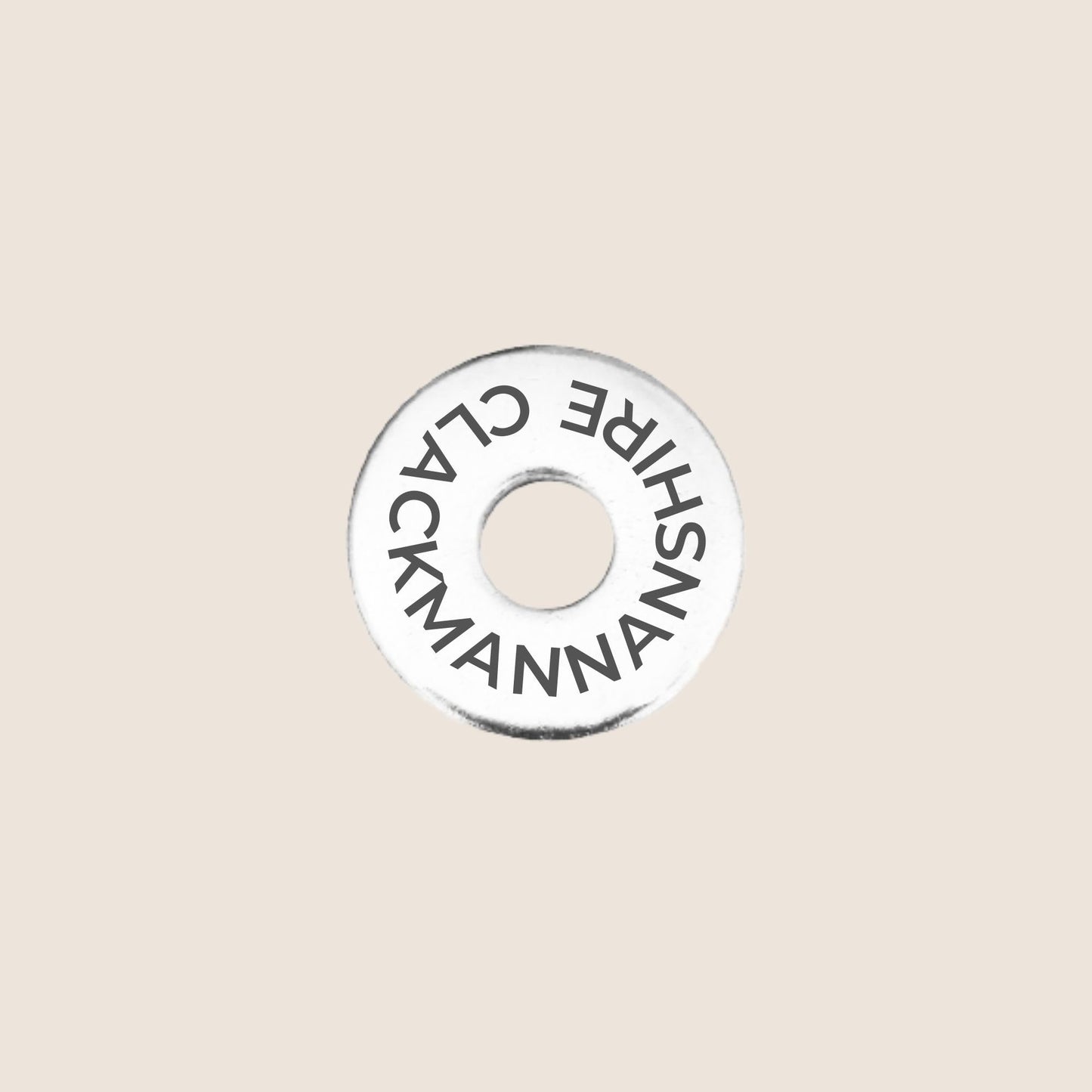 Engraved stainless steel token for each UK County visited, this token is engraved with Clackmannanshire.