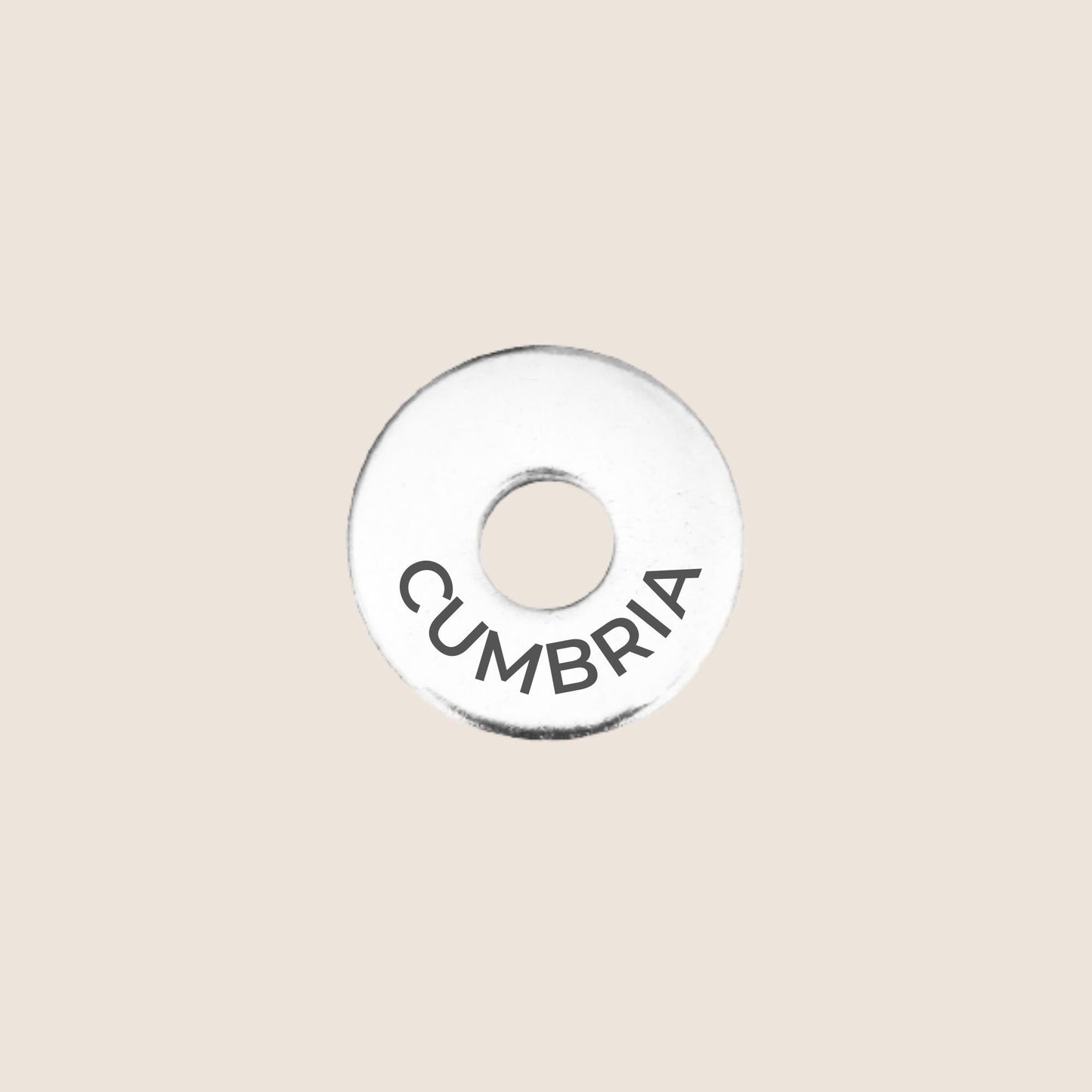 Engraved stainless steel token for each UK County visited, this token is engraved with Cumbria.