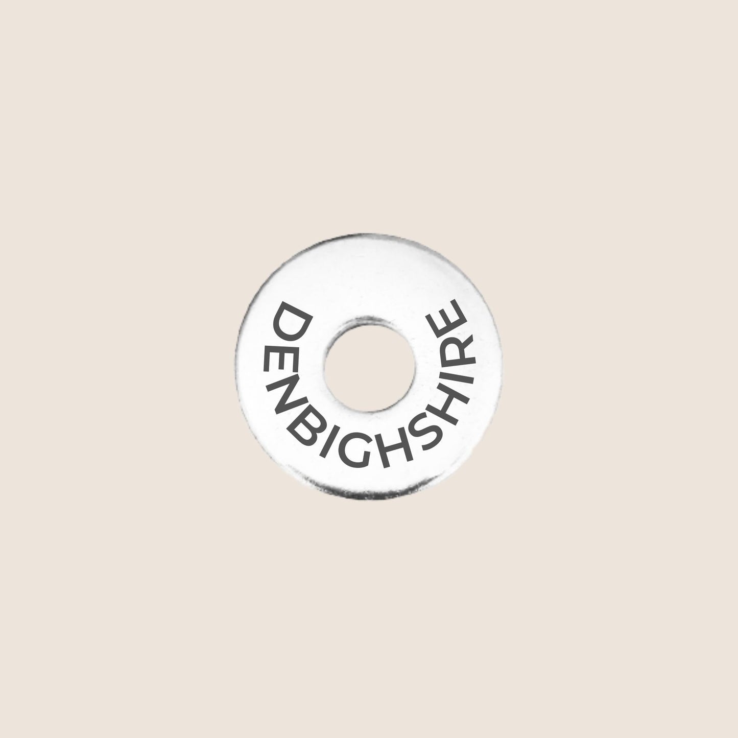 Engraved stainless steel token for each UK County visited, this token is engraved with Denbighshire.