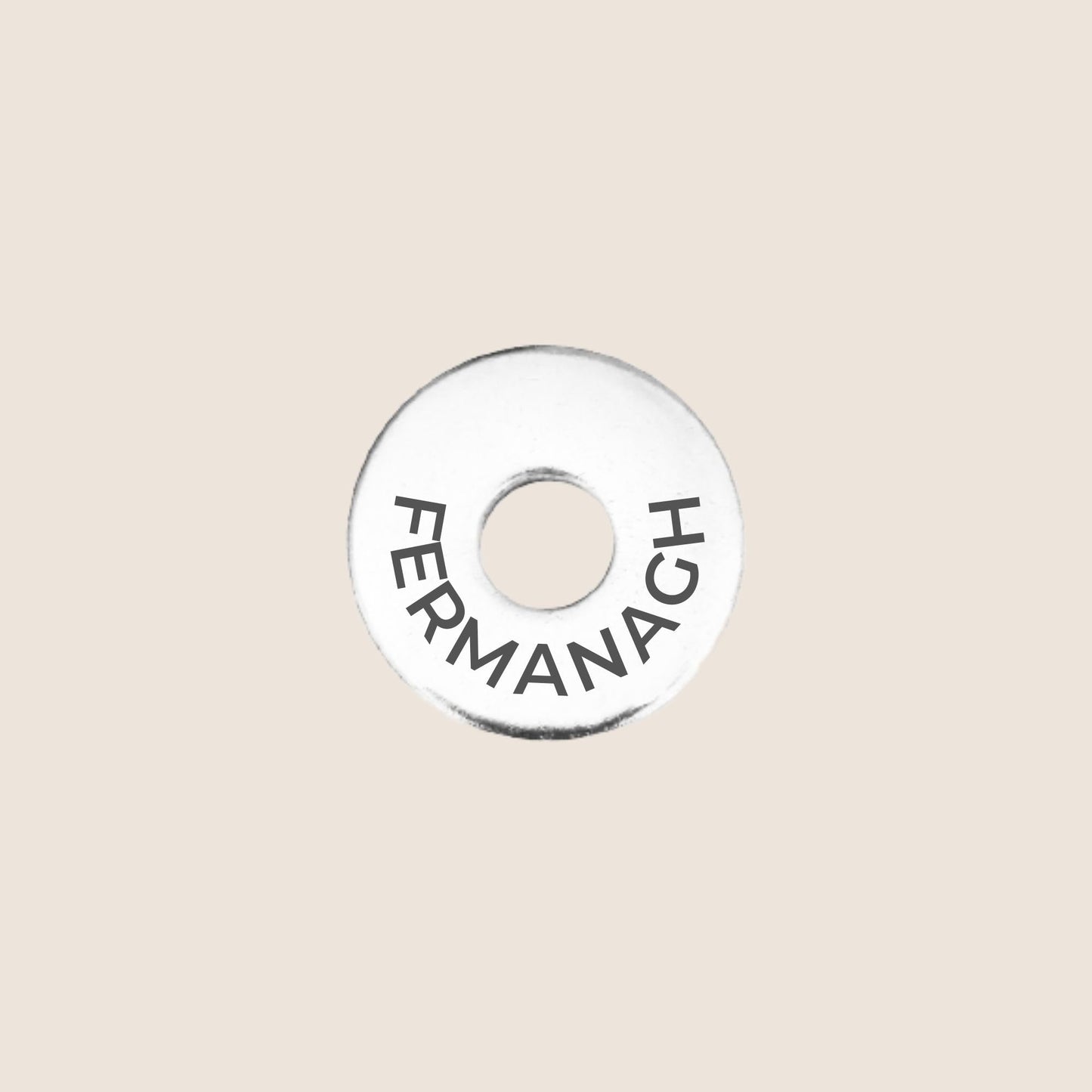 Engraved stainless steel token for each UK County visited, this token is engraved with Fermanagh.
