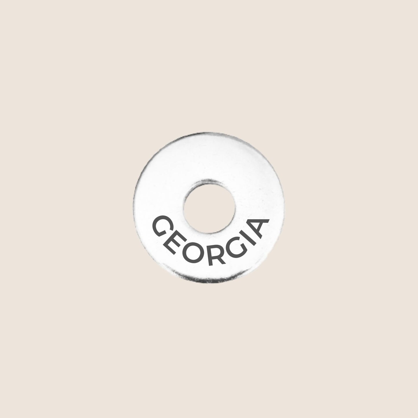 Engraved Georgia US State Token in stainless steel to add to your travel keepsake collection for your USA adventures.