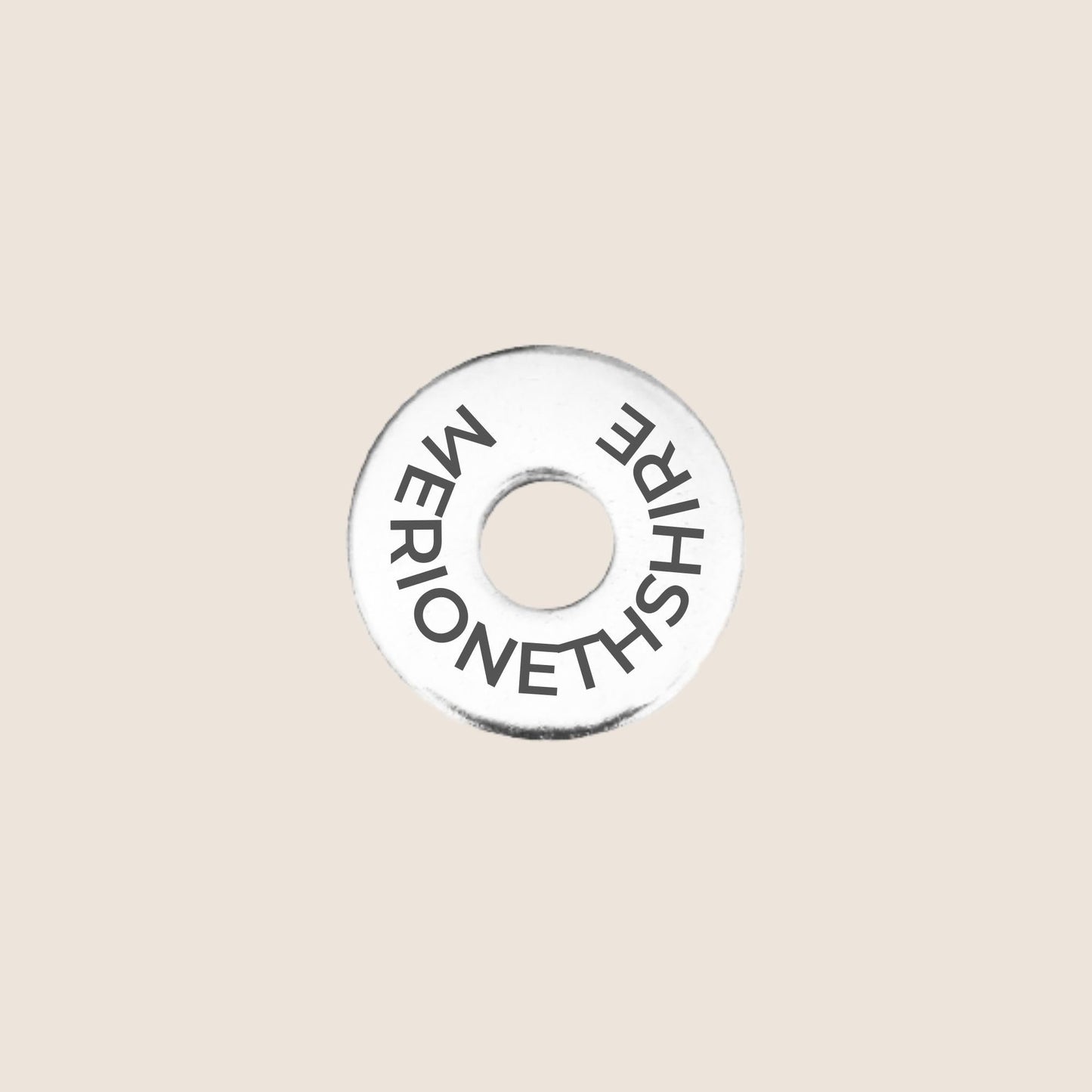 Engraved stainless steel token for each UK County visited, this token is engraved with Merionethshire.