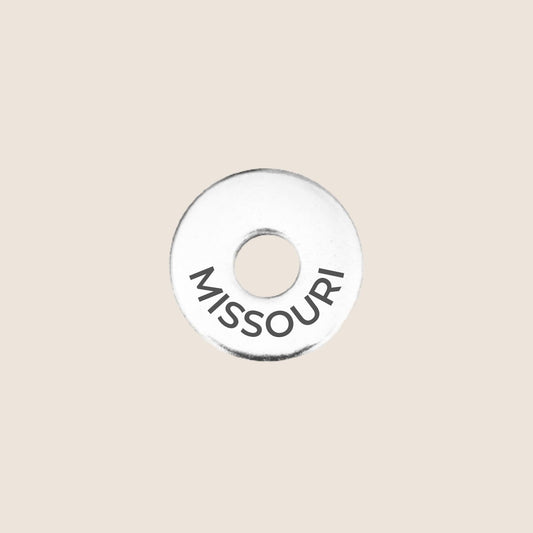 Engraved Missouri US State Token in stainless steel to add to your travel keepsake collection for your USA adventures.