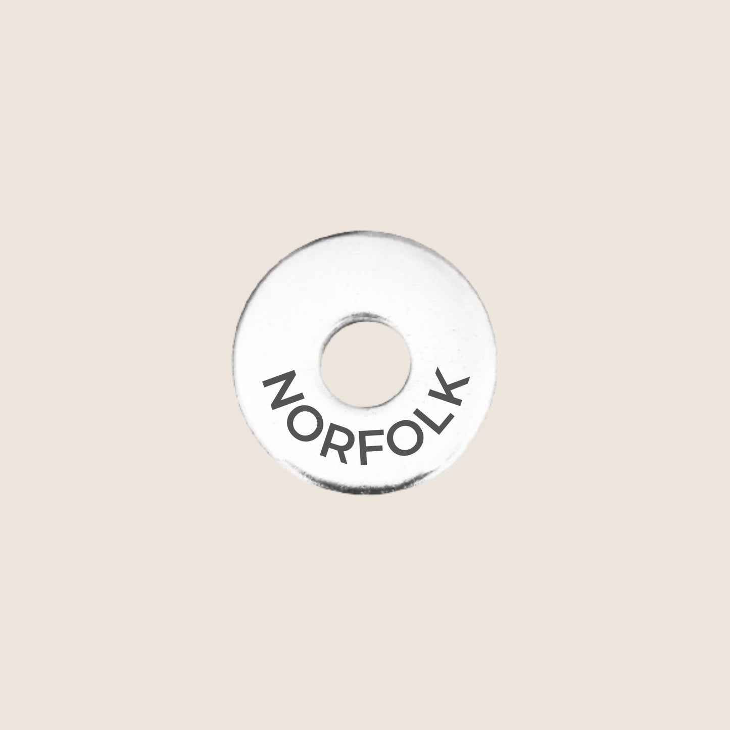 Engraved stainless steel token for each UK County visited, this token is engraved with Norfolk.