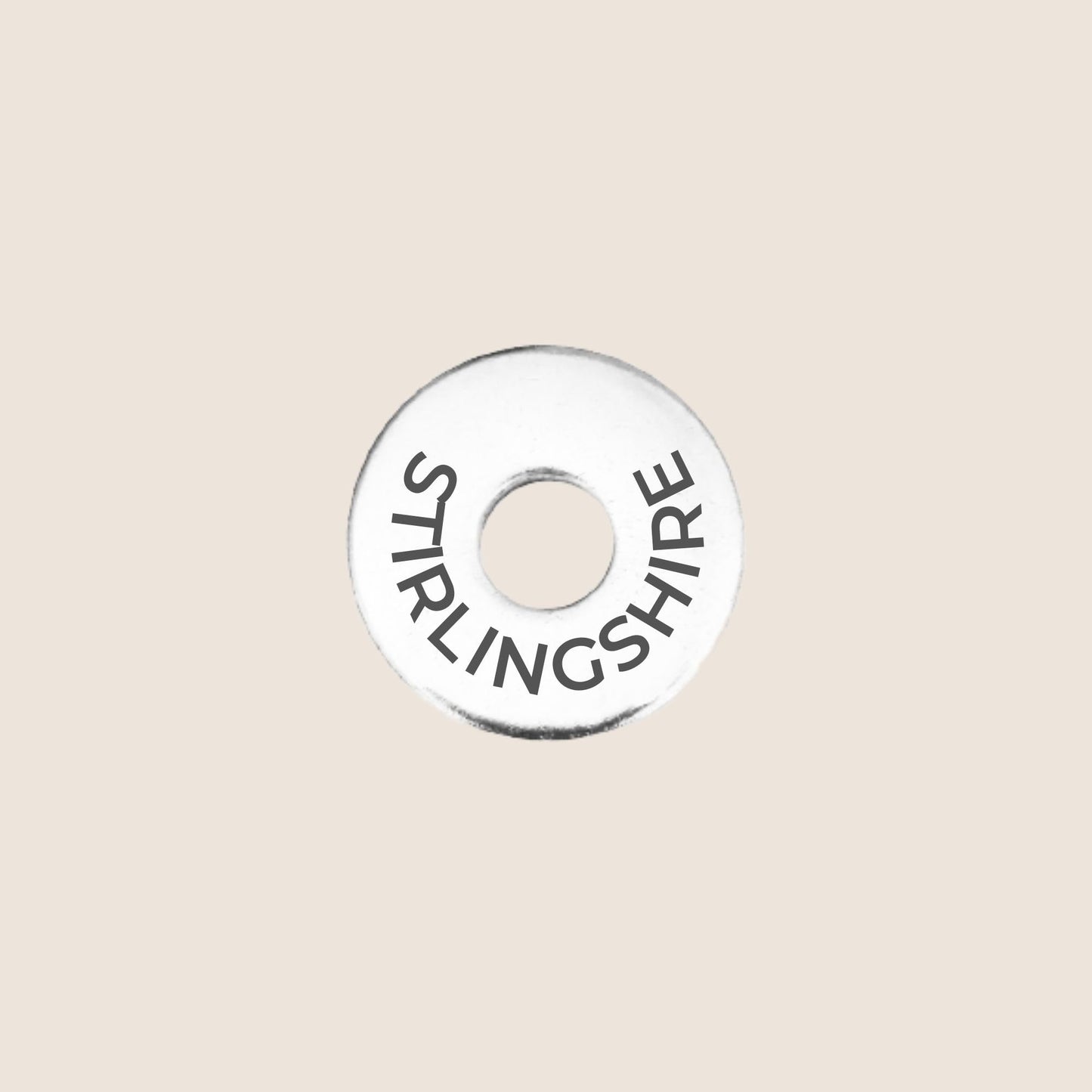 Engraved stainless steel token for each UK County visited, this token is engraved with Stirlingshire.