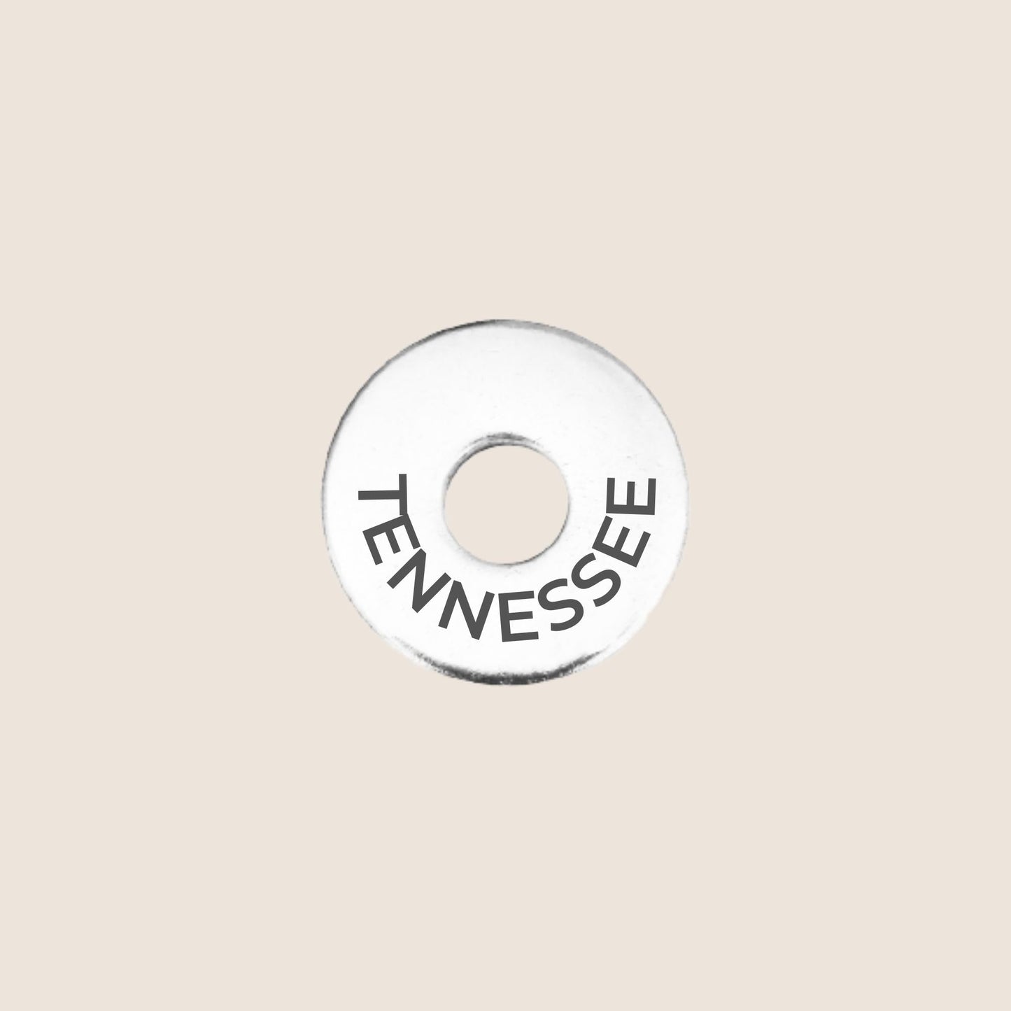 Engraved Tennessee US State Token in stainless steel to add to your travel keepsake collection for your USA adventures.