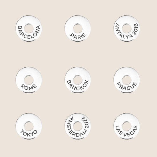 examples of Cities engraved on travel tokens, perfect gift for travellers