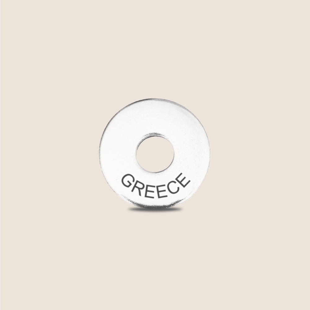 Engraved Greece Country Token to remember your holiday, adding it to your travel keychain to make the perfect keepsake.