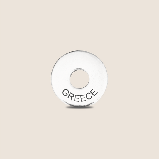 Engraved Greece Country Token to remember your holiday, adding it to your travel keychain to make the perfect keepsake.